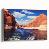 Framed canvas depicting Lake Powell with a vintage poster art style in vibrant blues and oranges.