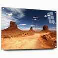 Acrylic print of Monument Valley with vivid orange and red hues, suitable for bedroom or dining room decor.