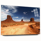 Acrylic print of Monument Valley with vivid orange and red hues, suitable for bedroom or dining room decor.
