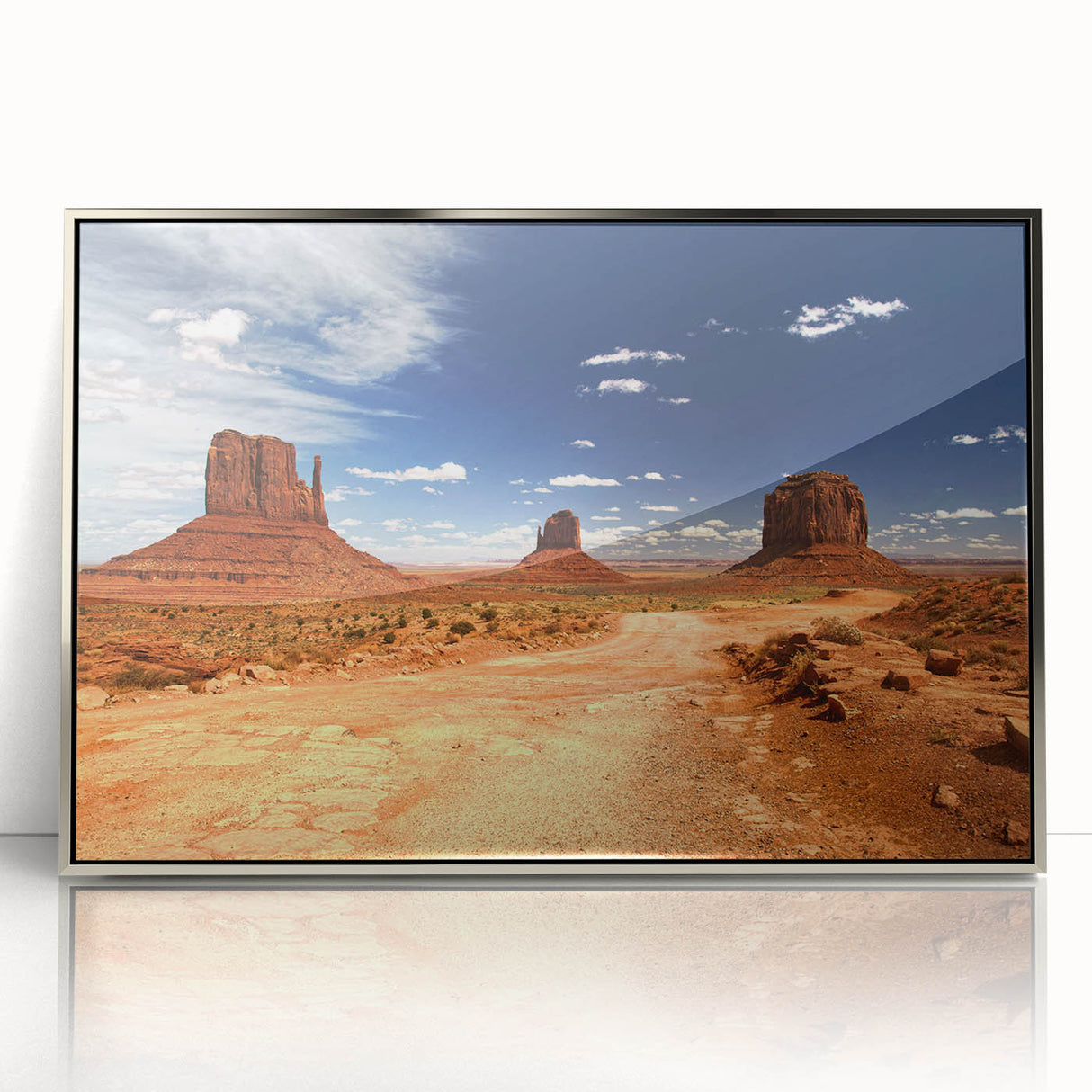 Mid-century modernist art depicting Monument Valley in muted earth tones on a framed acrylic panel.