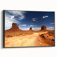 Black and white framed canvas of Monument Valley, ideal for bedroom wall art in a vintage poster style.