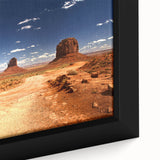 Extra large framed canvas of Monument Valley in black with colorful, textured art, ideal for living room decor.