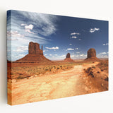 Monument Valley landscape on large stretched canvas with vivid red and orange tones, suitable for kitchen wall art.