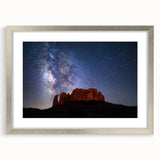 Textured art depicting abstract Sedona landscape in earthy red and orange tones on a silver-framed mat.