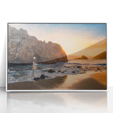 Acrylic print of Big Sur coastline in muted blue and green hues, framed in white, suitable for modern nursery decor.