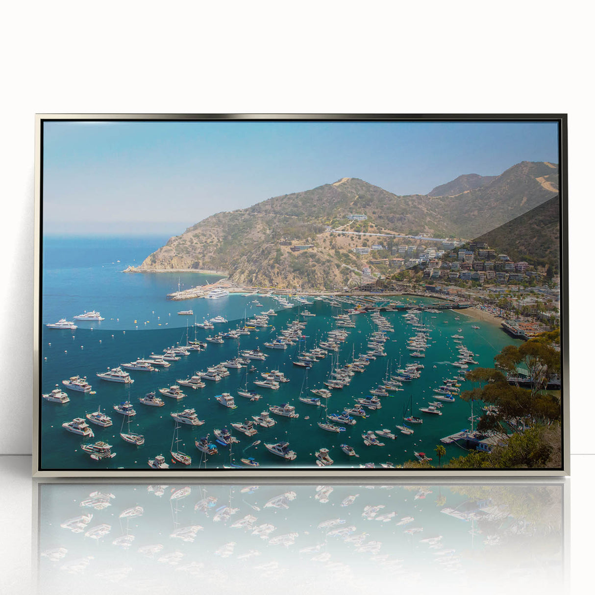 Mid-century modernist art depicting Catalina, California in acrylic with silver frame, in soft pastel shades.