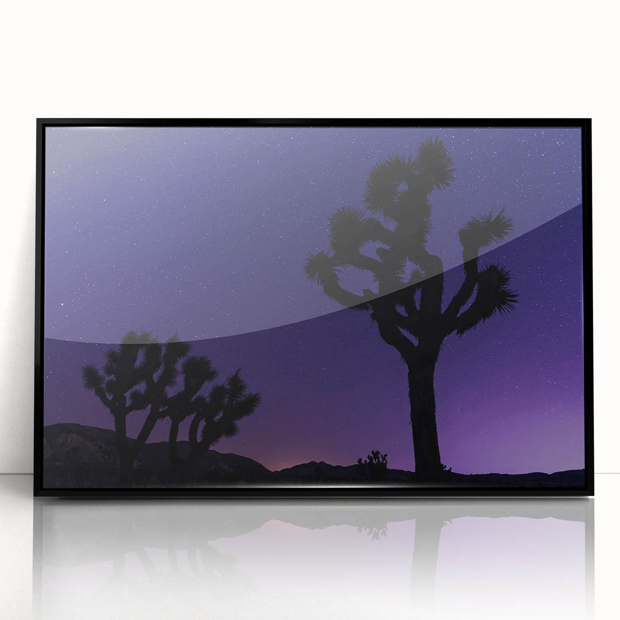 Large abstract wall art featuring a Joshua tree with muted earth tones on a framed acrylic.