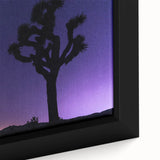 Framed canvas featuring a textured depiction of Joshua trees under a starry sky in muted black and vibrant colors.