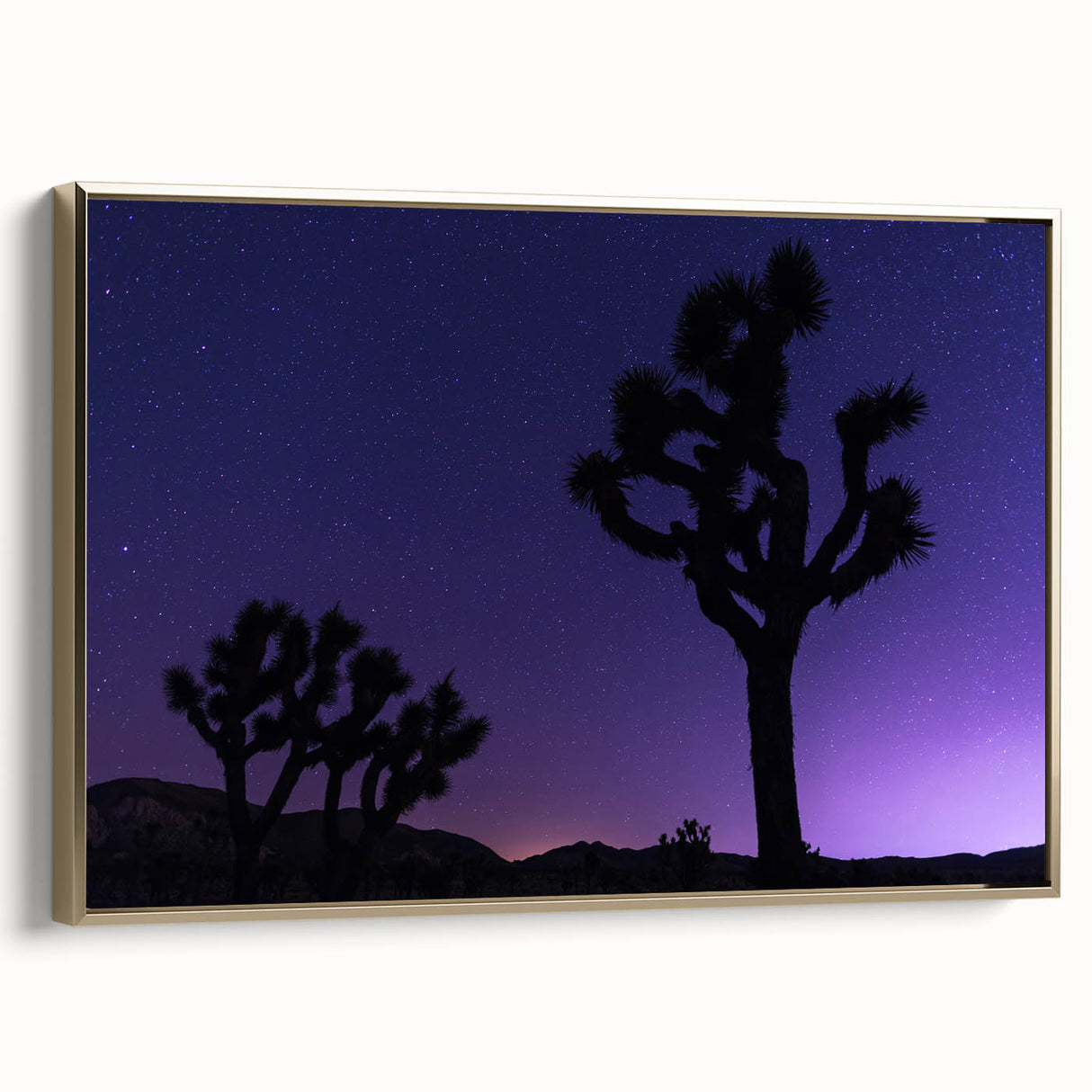 Vintage poster art of Joshua Tree landscape on framed canvas, featuring muted earth tones, ideal for bedroom wall decor.