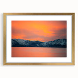 Extra large abstract art print of Lake Tahoe with textured details in muted blues and greens, framed in gold.