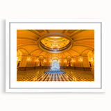 Abstract art print of Sacramento scenery in muted earth tones on a white-framed canvas, ideal for dining room decor.