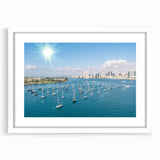 Abstract art print of San Diego skyline in muted blue and gray tones on a framed white mat.