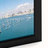 Close-up of textured black wall art featuring a colorful San Diego scenery on a framed canvas, ideal for living room decor.