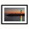 Colorful abstract art print of Santa Cruz in vibrant hues on a large textured canvas, framed in black.
