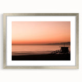 Textured abstract art print of Santa Monica in muted blue and gray tones, framed in silver, ideal for bedroom art.