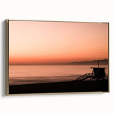 Framed canvas wall art depicting a vintage-style Santa Monica landscape in muted gold and black tones.