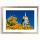 Textured abstract art print of Denver skyline in muted silver and gray tones on a framed canvas, ideal for bedroom art.