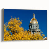 Framed canvas of vintage Denver landscape with colorful art on black background, ideal for living room decor.