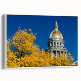 Vintage poster art of Denver skyline in colorful hues on extra large framed canvas, suitable for living room decor.