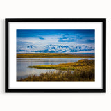 Extra large abstract art print of Colorado Springs in vibrant colors on a textured canvas, framed in black.