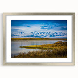 Textured abstract art print depicting Colorado Springs in muted earth tones, framed in silver, ideal for bedroom art.
