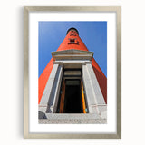 Textured art depicting an abstract Daytona scenery in muted blue and green tones on a framed silver mat.