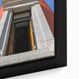 Framed canvas of Daytona scenery in black with colorful, textured details, ideal for large living room walls.