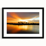 Extra large abstract art print of the Everglades in vibrant, textured colors on a framed black mat.