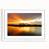 Abstract art print of the Everglades in muted green and blue tones, framed with a white mat.