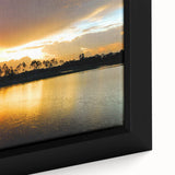 Close-up of textured black wall art depicting the Everglades, with vibrant green and blue hues, framed canvas.