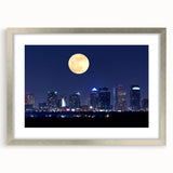 Textured abstract art print of Tampa scenery in muted blue and green tones on a framed canvas, ideal for bedroom art.