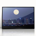 Large abstract wall art depicting the Tampa skyline in muted gray and blue tones on a framed acrylic print.
