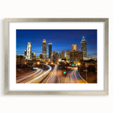 Textured abstract art print of the Atlanta skyline in silver frame, ideal for modern bedroom decor.