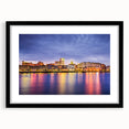 Extra large abstract art print of Savannah scenery in colorful textured hues on a framed black mat.
