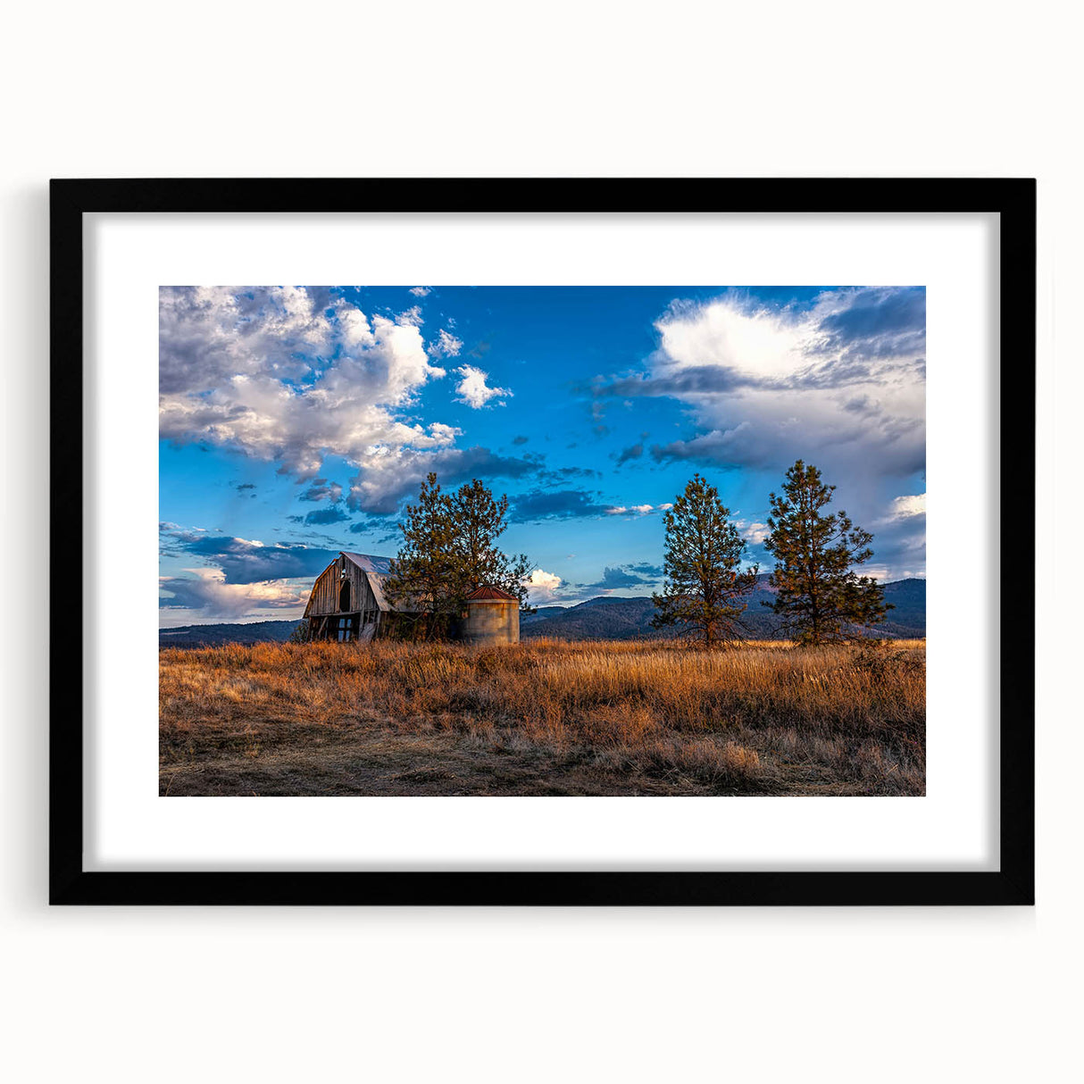 Extra large abstract art print depicting vibrant, colorful Idaho scenery on a textured canvas, framed in black.