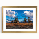 Extra large abstract art print of Idaho scenery in gold frame, featuring textured brushstrokes in earthy tones.