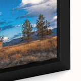 Extra large framed canvas featuring a textured depiction of an Idaho scenery in black with colorful accents.