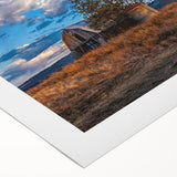 Art deco poster of Idaho scenery on rolled canvas, featuring muted earth tones, ideal for dining room wall art.