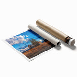 Rolled print of Idaho scenery with soft floral accents in muted earth tones.
