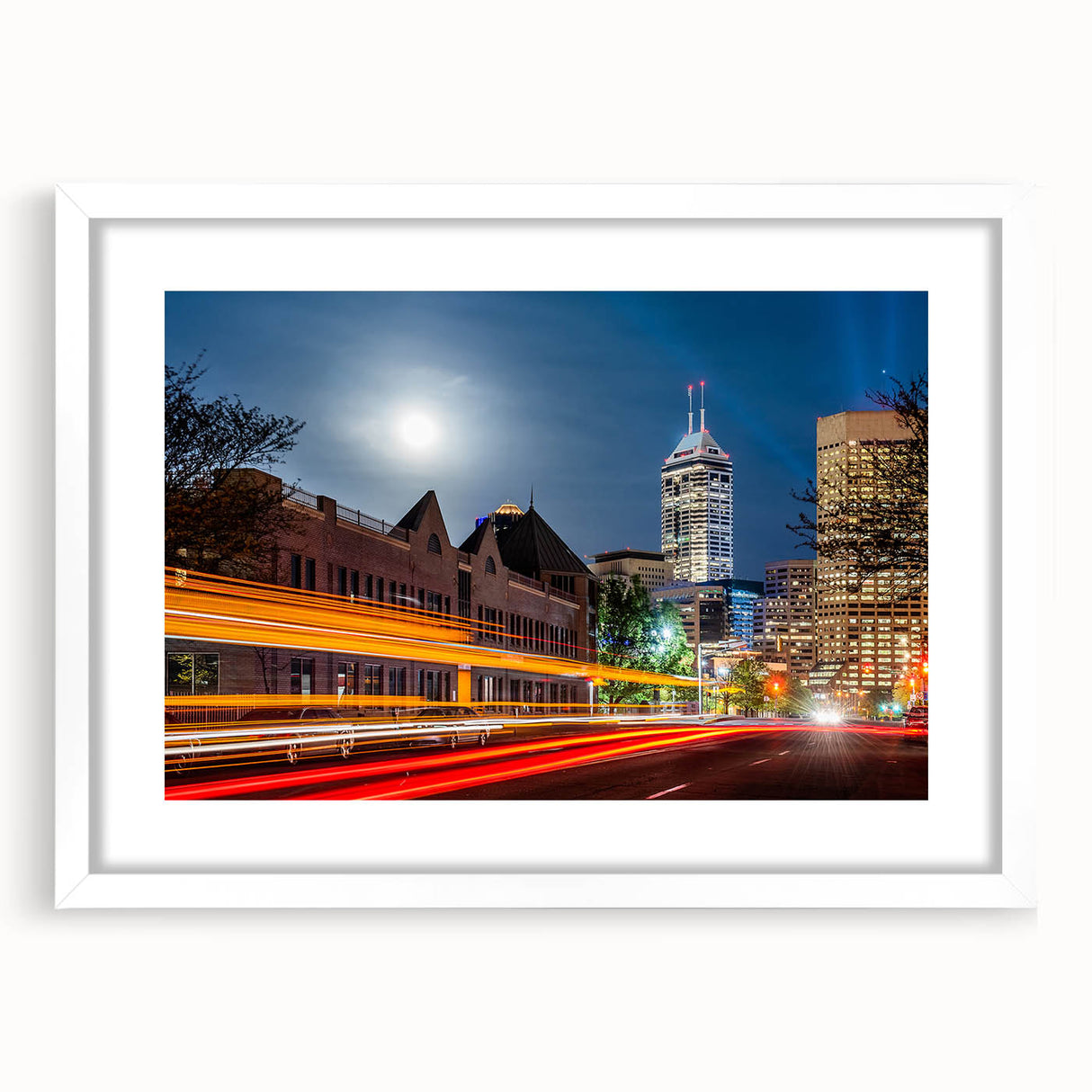 Abstract art print of Indianapolis skyline in muted gray and blue tones on a framed canvas, ideal for dining room decor.