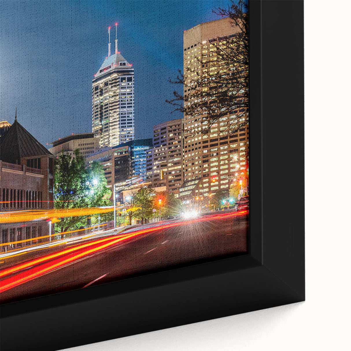 Black wall art featuring a textured Indianapolis skyline in vibrant colors on a large framed canvas.