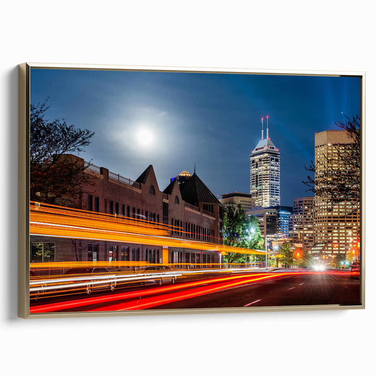 Framed canvas of Indianapolis skyline in muted gold and black tones, suitable as wall art for bedroom.