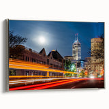 Framed canvas landscape art painting of Indianapolis skyline in muted gray and vibrant blues, ideal for office decor.
