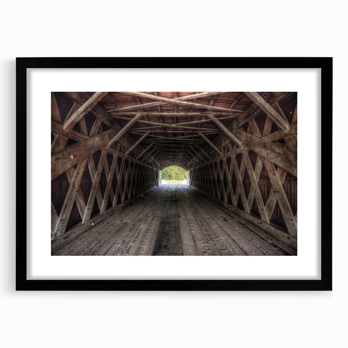 Extra large abstract art print of a colorful, textured Iowa landscape in a black frame, ideal for living room decor.
