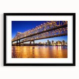 Abstract art print of a colorful Louisiana landscape in muted earth tones on a large framed canvas.