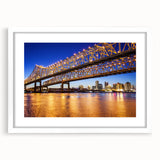 Abstract art print depicting a Louisiana landscape in muted earth tones on a framed white mat.