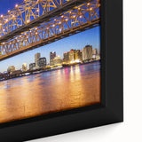 Extra large framed canvas featuring a textured depiction of a Louisiana scenery in black with colorful accents.