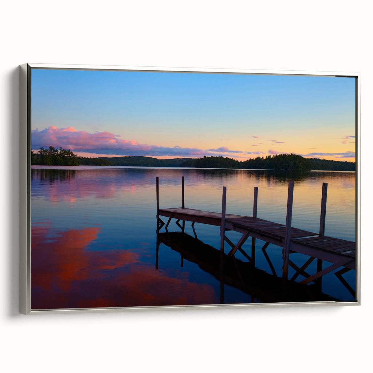 Framed canvas featuring a vintage-style landscape painting of Maine, with colorful art in muted green and blue tones.