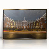 Framed acrylic print of Annapolis skyline in muted gold and blue shades, mid-century modernist style.