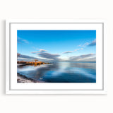 Abstract art print of Chesapeake Bay in muted blue and green tones on a white framed canvas, suitable for dining room decor.